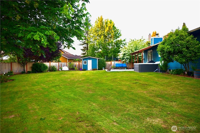 4313 131st St SE, Everett, WA 98208 - fenced backyard with a shed and a hot tub