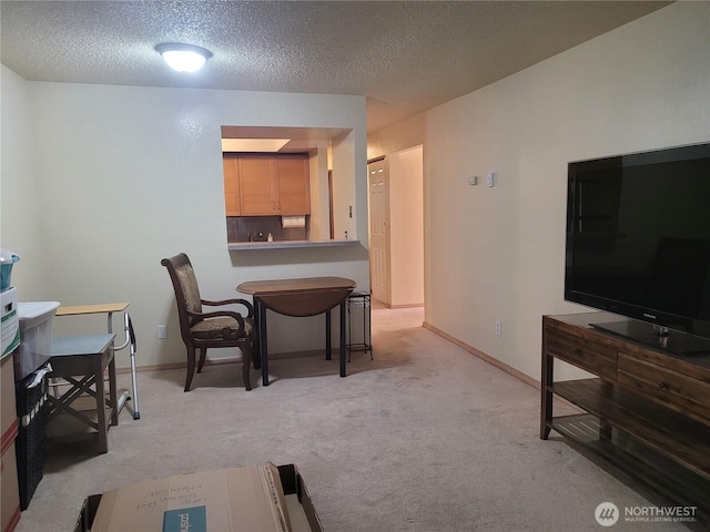 33010 17th Pl S Unit A-108, Federal Way, WA 98003 - dining room featuring light carpet and a textured ceiling