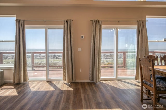 1511 E Ocean Shores Blvd SW, Ocean Shores, WA 98569 - dining space featuring dark wood finished floors and baseboards