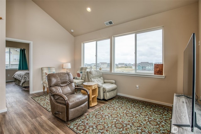 1511 E Ocean Shores Blvd SW, Ocean Shores, WA 98569 - sitting room featuring healthy amount of natural light, wood finished floors, high vaulted ceiling, and recessed lighting