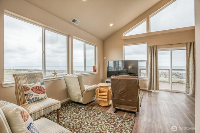 1511 E Ocean Shores Blvd SW, Ocean Shores, WA 98569 - living room with lofted ceiling, wood finished floors, and recessed lighting