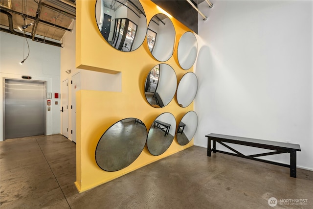 1111 E Pike St Unit 302, Seattle, WA 98122 - detailed view of elevator and concrete flooring