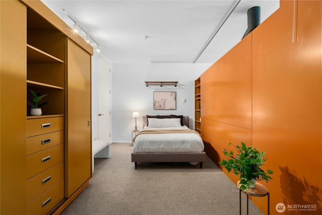 1111 E Pike St Unit 302, Seattle, WA 98122 - carpeted bedroom featuring track lighting