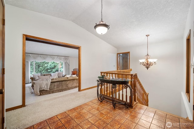 14000 NE 97th Ave, Vancouver, WA 98662 - hall with an upstairs landing, lofted ceiling, carpet, and a chandelier
