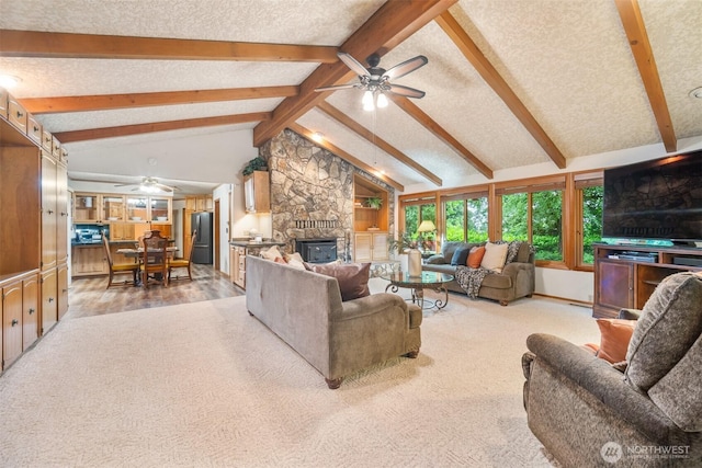 14000 NE 97th Ave, Vancouver, WA 98662 - living area featuring ceiling fan, a fireplace, carpet flooring, and a textured ceiling
