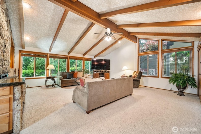 14000 NE 97th Ave, Vancouver, WA 98662 - living room featuring carpet floors, a textured ceiling, ceiling fan, and a stone fireplace