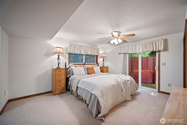 14000 NE 97th Ave, Vancouver, WA 98662 - bedroom featuring access to outside, light colored carpet, ceiling fan, and a textured ceiling