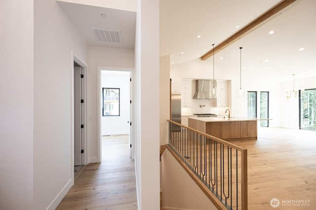 24018 Dolphin Ln, Mount Vernon, WA 98274 - corridor featuring light wood-type flooring and recessed lighting