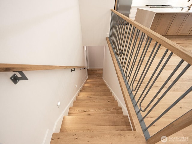 24018 Dolphin Ln, Mount Vernon, WA 98274 - stairway featuring baseboards and wood finished floors