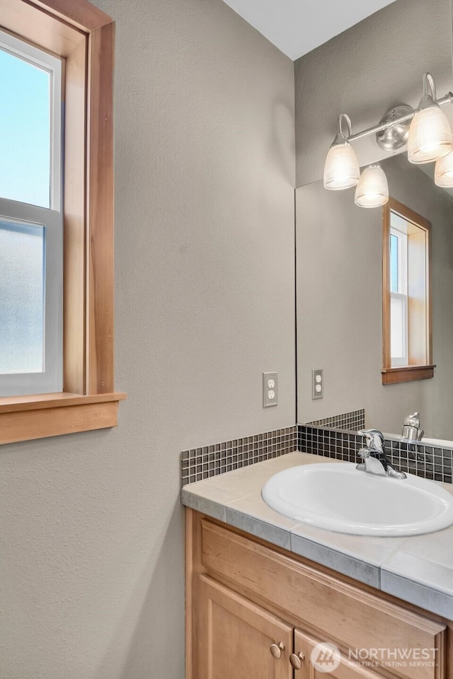 4138 21st Ave SW, Seattle, WA 98106 - bathroom with vanity and healthy amount of natural light