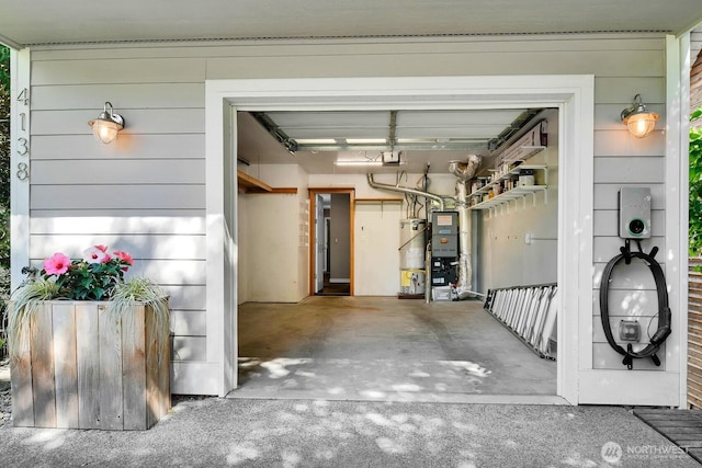 4138 21st Ave SW, Seattle, WA 98106 - garage with water heater and a garage door opener