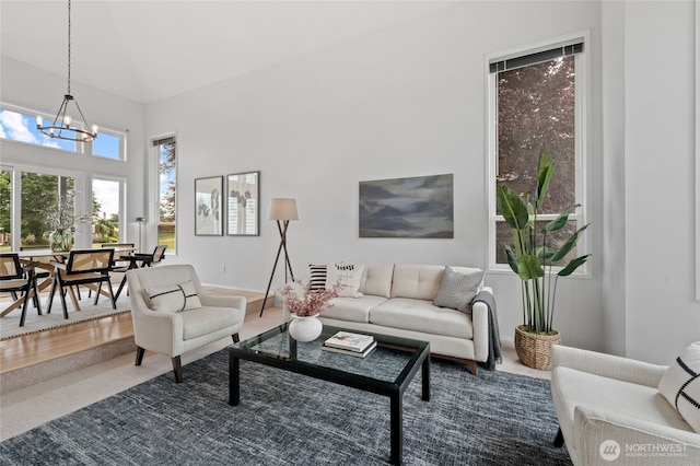 19724 Island Pkwy E, Lake Tapps, WA 98391 - carpeted living area with a chandelier
