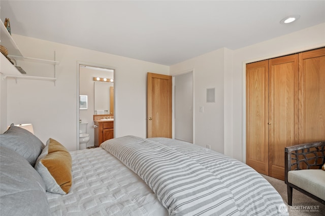 19724 Island Pkwy E, Lake Tapps, WA 98391 - carpeted bedroom featuring a closet and connected bathroom