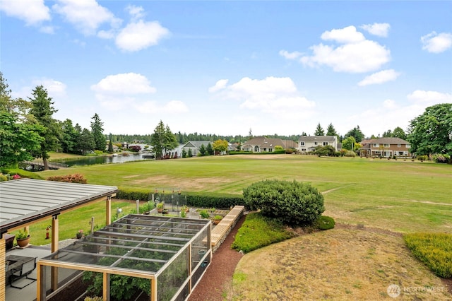 19724 Island Pkwy E, Lake Tapps, WA 98391 - view of grassy yard with a water view and a residential view