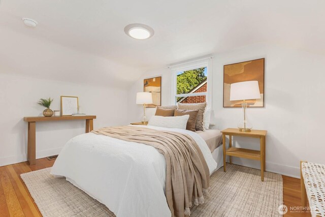 1214 NE 98th St, Seattle, WA 98115 - bedroom featuring light wood-style floors and lofted ceiling