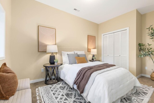 1214 NE 98th St, Seattle, WA 98115 - bedroom with carpet floors and a closet