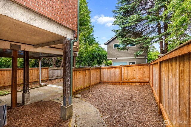 1214 NE 98th St, Seattle, WA 98115 - fenced backyard with a patio