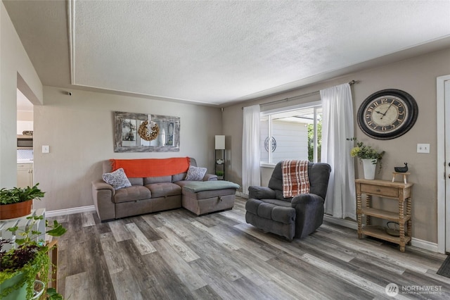 863 N Vista Dr, Moses Lake, WA 98837 - living room with wood finished floors and a textured ceiling