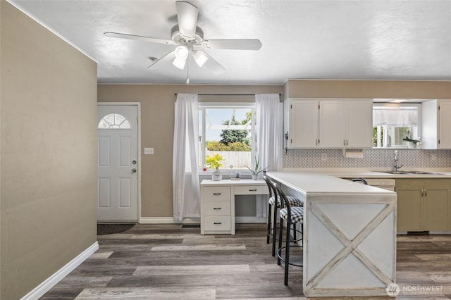 863 N Vista Dr, Moses Lake, WA 98837 - kitchen with a ceiling fan, healthy amount of natural light, and light countertops