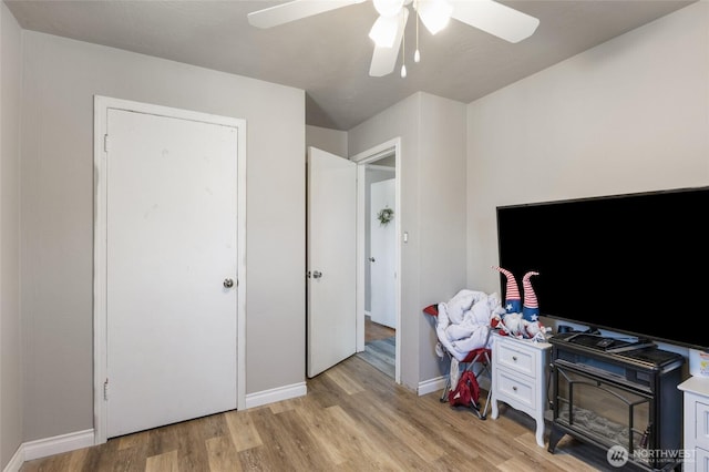 863 N Vista Dr, Moses Lake, WA 98837 - bedroom with light wood-style floors and ceiling fan