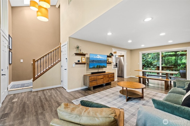 17627 17th Dr SE, Bothell, WA 98012 - living room with stairway, wood finished floors, and recessed lighting