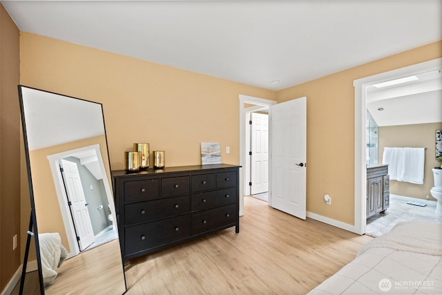 17627 17th Dr SE, Bothell, WA 98012 - bedroom with light wood-style flooring and connected bathroom