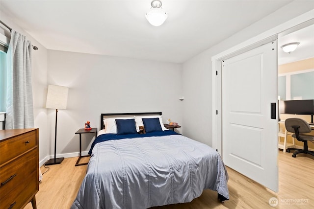 17627 17th Dr SE, Bothell, WA 98012 - bedroom featuring light wood-style floors and a desk