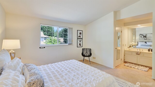 16159 SE 33rd Cir Unit 603, Bellevue, WA 98008 - carpeted bedroom with lofted ceiling and ensuite bath