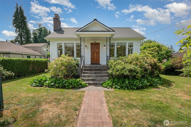 515 N 122nd St, Seattle, WA 98133 - bungalow with a front lawn and a chimney