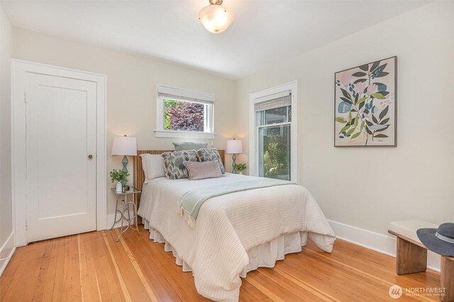 515 N 122nd St, Seattle, WA 98133 - bedroom featuring light wood-style flooring and baseboards