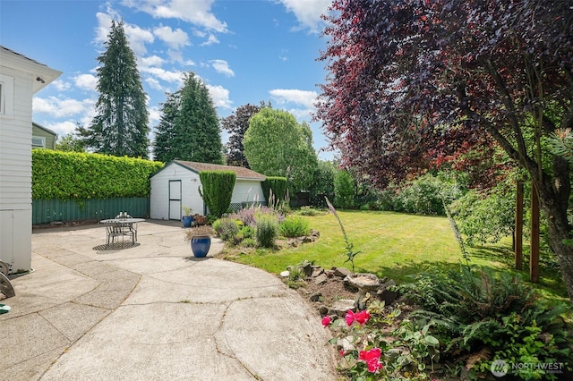 515 N 122nd St, Seattle, WA 98133 - view of grassy yard with a patio and a storage shed