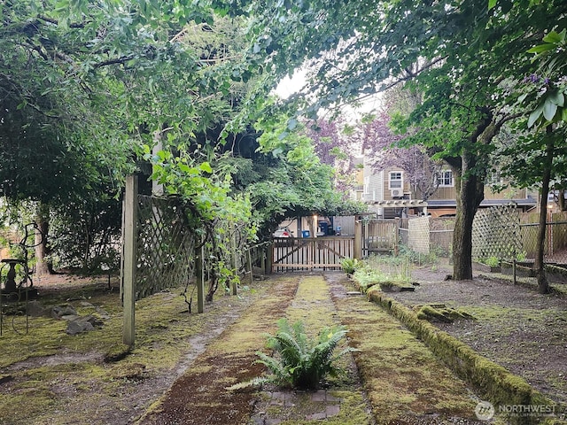 3616 23rd Ave W, Seattle, WA 98199 - view of yard featuring a gate
