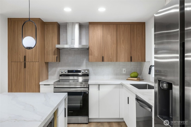 12816 SE 185th Pl, Renton, WA 98058 - kitchen with appliances with stainless steel finishes, wall chimney range hood, tasteful backsplash, light stone countertops, and modern cabinets