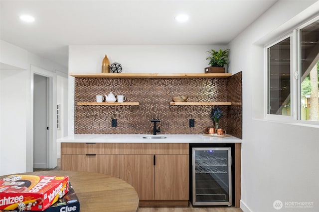 12816 SE 185th Pl, Renton, WA 98058 - indoor wet bar with beverage cooler, tasteful backsplash, and recessed lighting