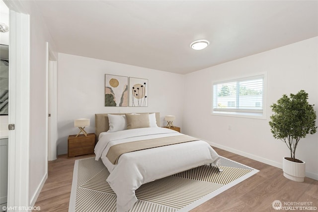 18501 52nd Ave W Unit 31, Lynnwood, WA 98037 - bedroom with light wood-type flooring and baseboards