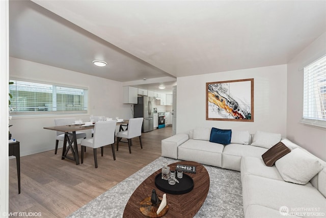18501 52nd Ave W Unit 31, Lynnwood, WA 98037 - living room featuring light wood-style floors and baseboards