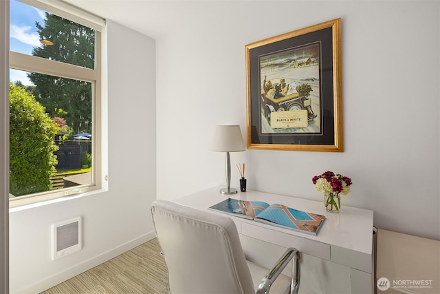 2808 14th Ave W Unit B, Seattle, WA 98119 - office area with heating unit and wood finished floors