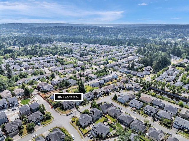 4021 220th St SE, Bothell, WA 98021 - aerial view of property and surrounding area featuring nearby suburban area