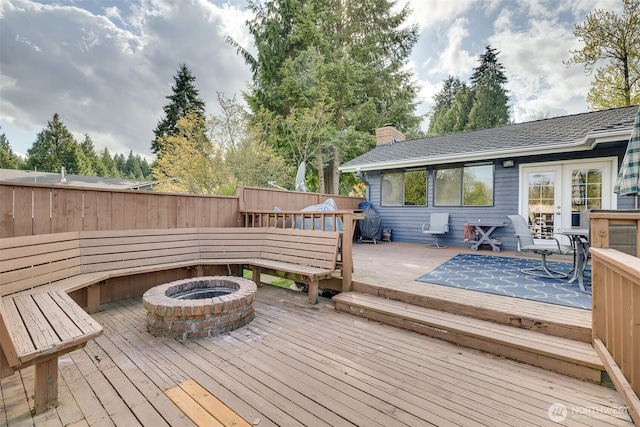 7617 160th St SE, Snohomish, WA 98296 - wooden terrace with an outdoor fire pit and french doors