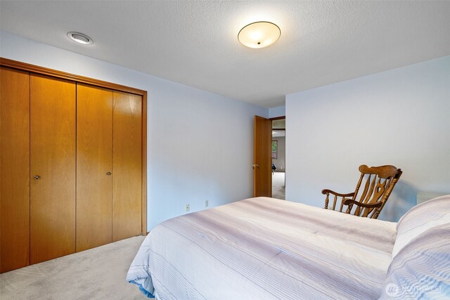 7617 160th St SE, Snohomish, WA 98296 - bedroom featuring carpet floors and a closet