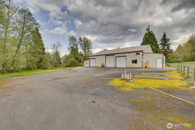 7617 160th St SE, Snohomish, WA 98296 - view of front of property featuring an outdoor structure and a garage