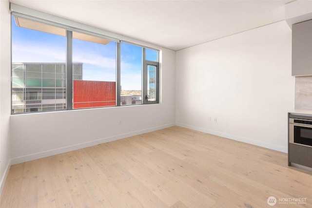 2510 6th Ave Unit 809, Seattle, WA 98121 - empty room with light wood-type flooring