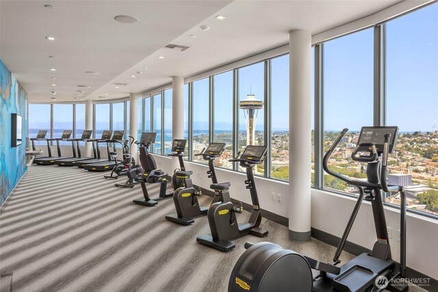 2510 6th Ave Unit 809, Seattle, WA 98121 - gym with recessed lighting, plenty of natural light, and carpet