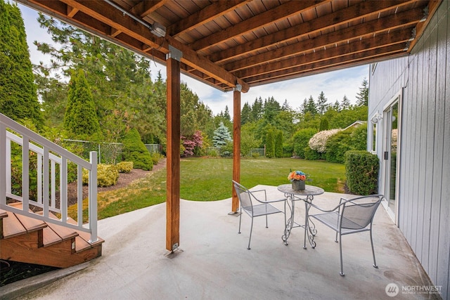 5908 3rd Dr W, Everett, WA 98203 - fenced backyard featuring a patio area, outdoor dining area, and view of wooded area