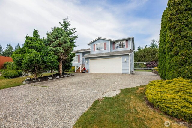 5908 3rd Dr W, Everett, WA 98203 - view of front of house featuring a garage and driveway