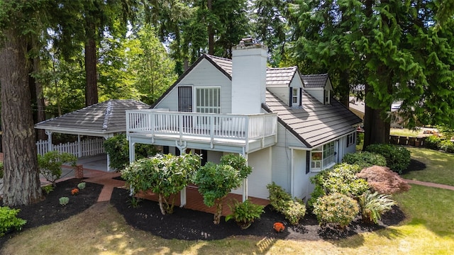 3706 84th Ave SE, Mercer Island, WA 98040 - back of house with a chimney and a balcony