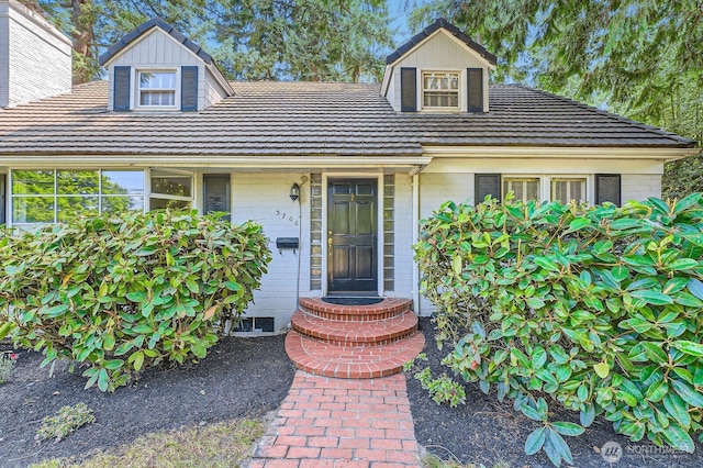 3706 84th Ave SE, Mercer Island, WA 98040 - property entrance featuring a tiled roof and brick siding