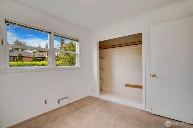 2602 Mccarver St, Tacoma, WA 98403 - unfurnished bedroom featuring carpet and a closet