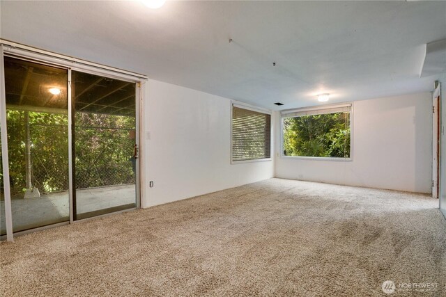 2602 Mccarver St, Tacoma, WA 98403 - empty room with carpet flooring