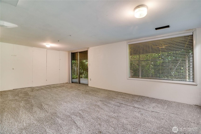 2602 Mccarver St, Tacoma, WA 98403 - unfurnished room featuring carpet